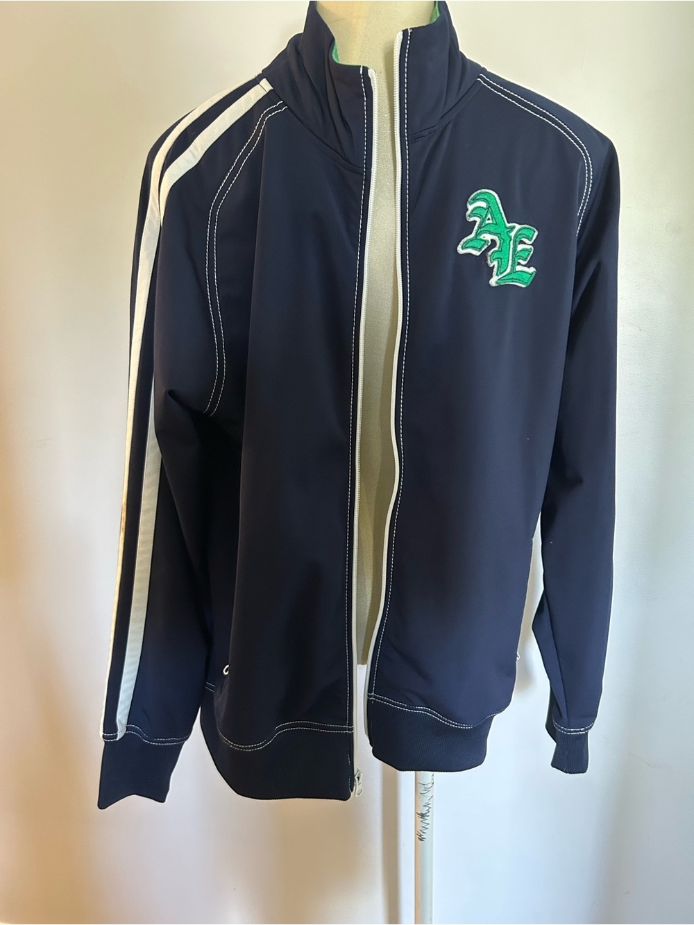 American Eagle Outfitters Navy Jacket with White Stripes and Green Logo unisex
